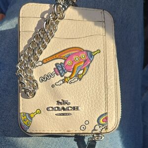 Coach Cream Card Holder with Vibrant Rocket Design